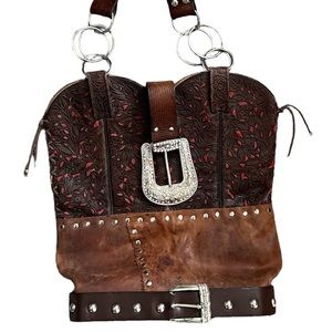 Beautiful western style purse, cowboy boots style. Great quality leather!